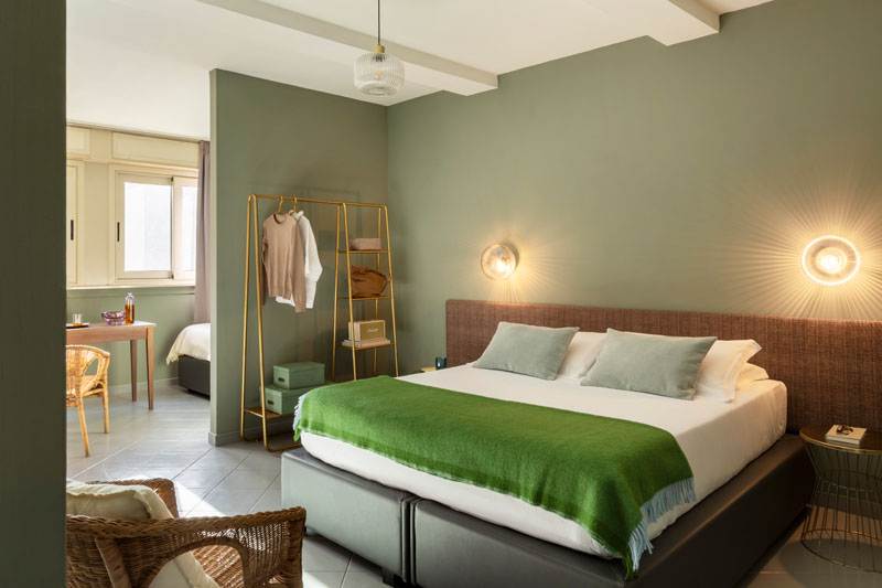 General view of the family room with double bed in the foreground - Hotel Marisa, BZAR hotels in Rome - View 1